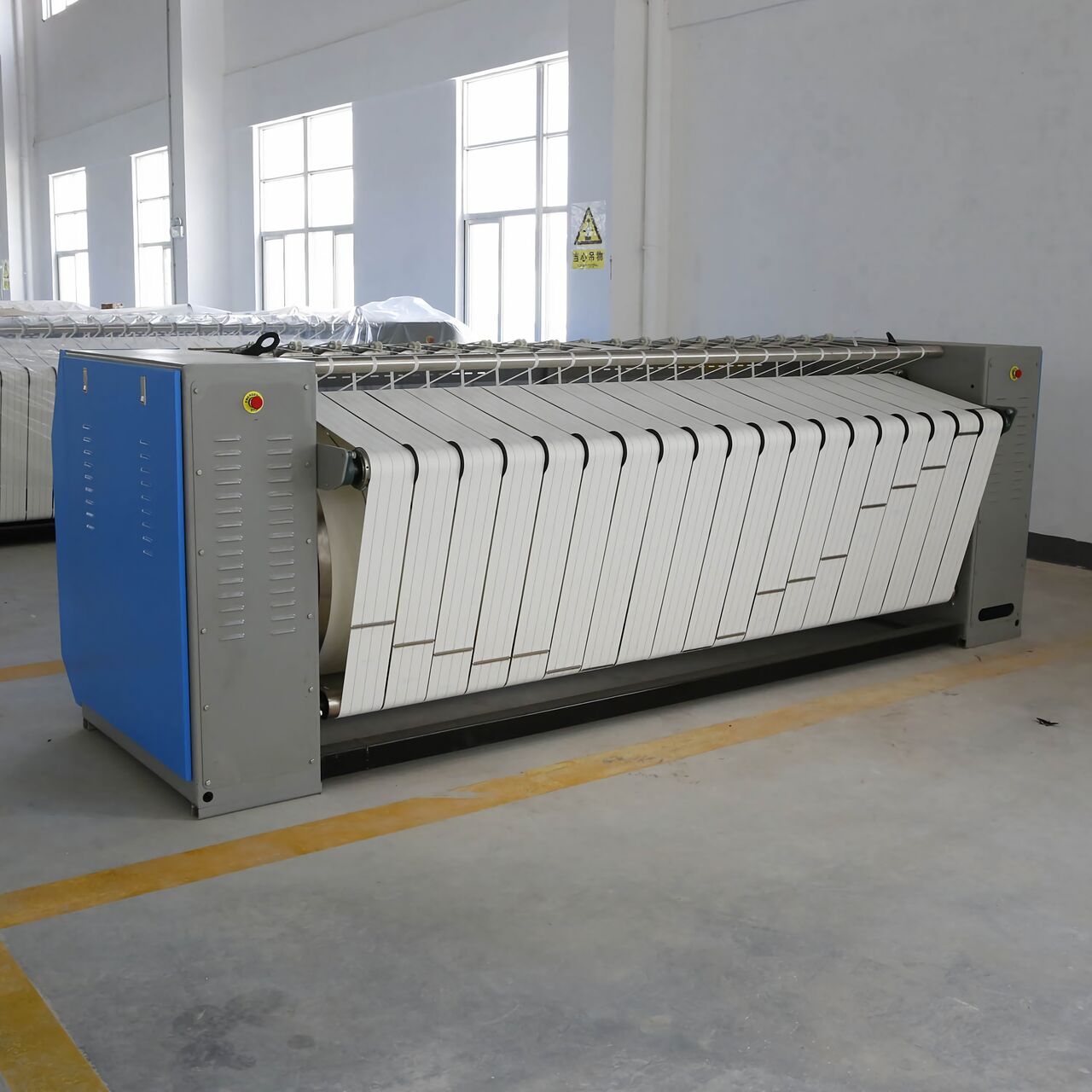酒店洗衣房为什么首选辊式烫平机？优势大盘点